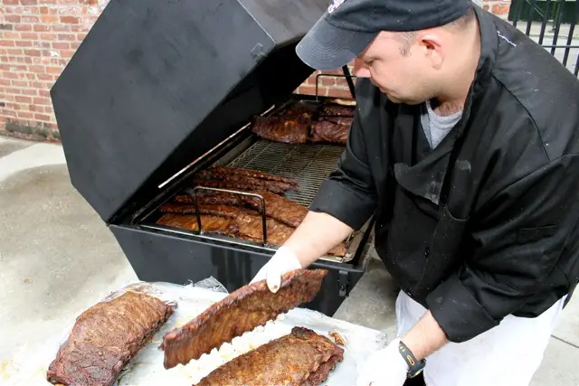 Endless racks of ribs being cooked to perfection.